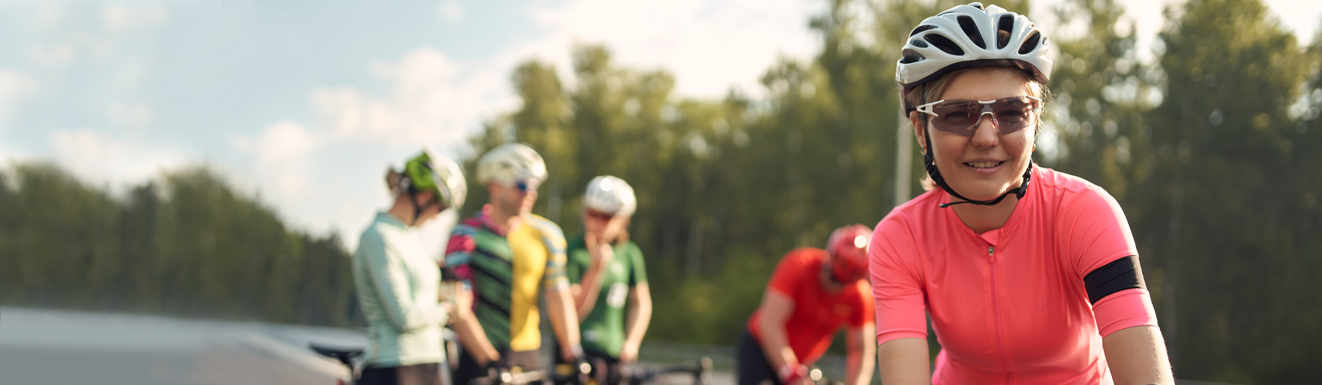 Female Cyclist with Bicycle Group