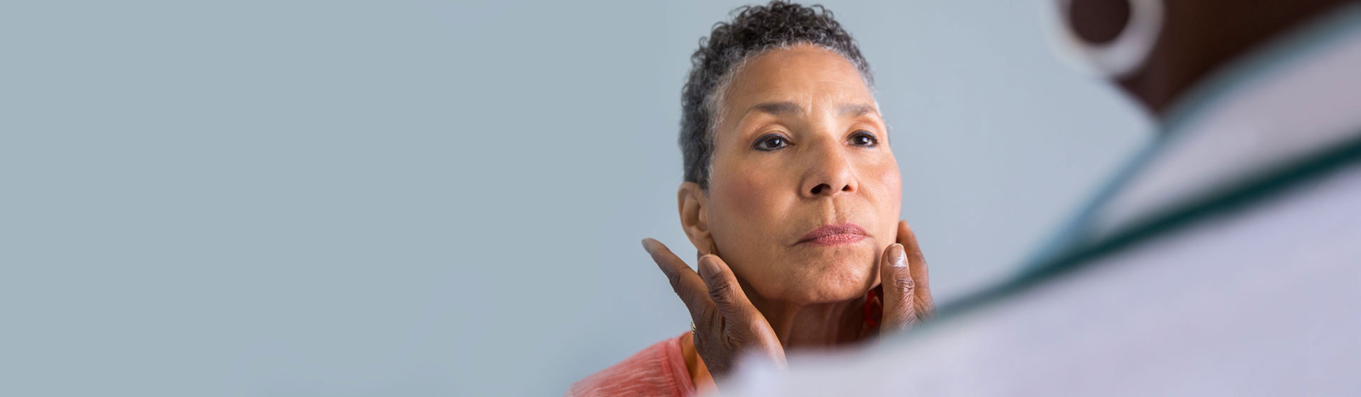 African American woman examined by female doctor